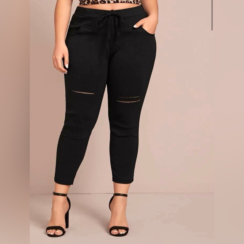 Ripped drawstring pants. NEVER WORN